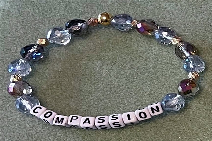 Hand-Crafted Beaded Stretch Bracelet: Word "Compassion"