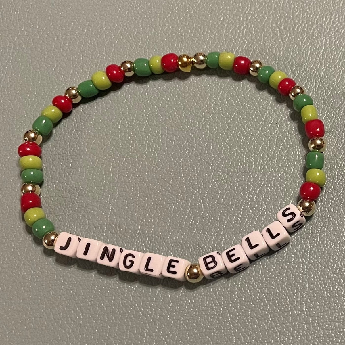 Hand-Crafted Beaded Winter Stretch Bracelet: Word "Jingle Bells"